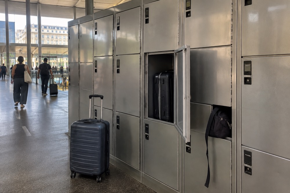 Rows of self-service luggage lockers in a Paris railway station