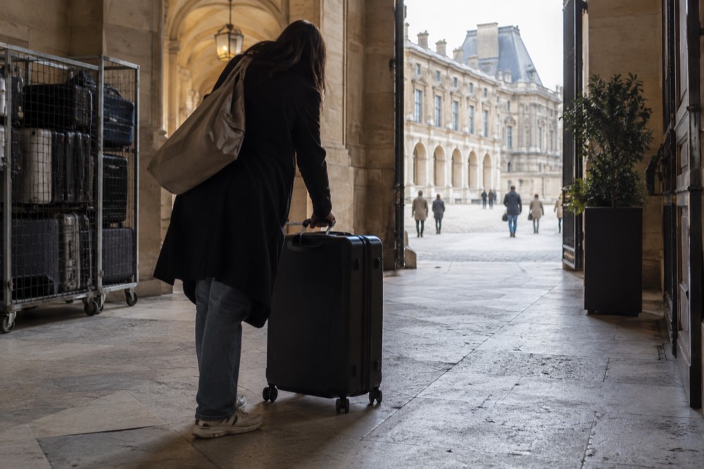 A suitcase left at the counter of a Paris storage point